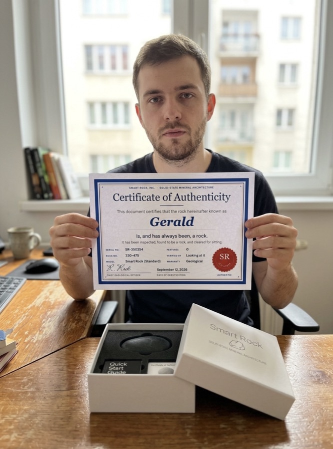 Owner holding the certificate for Gerald